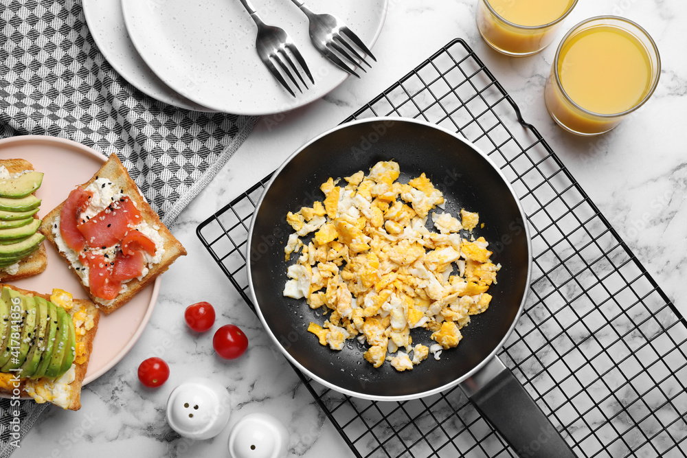 Delicious breakfast served on white marble table, flat lay Delicious breakfast served on white marble table, flat lay