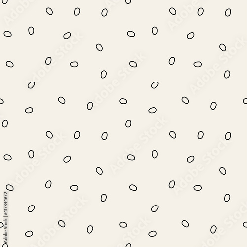 Vector seamless pattern. Randomly spaced rings. Abstract geometric background. Scattered monochrome dots. elements. Straggling chaotic dots.