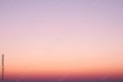 blurred sunset night sky background for summer season concept. © AlexLit
