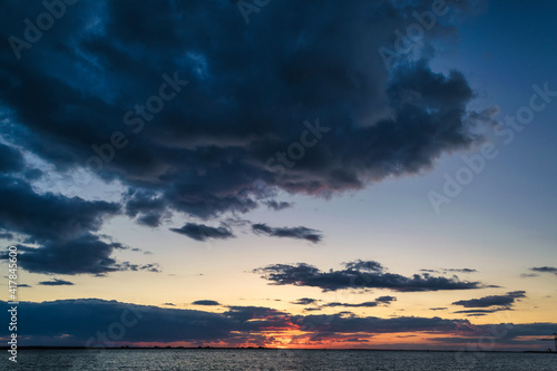 Scenic View Of Silhouette Trees Against Orange Sky