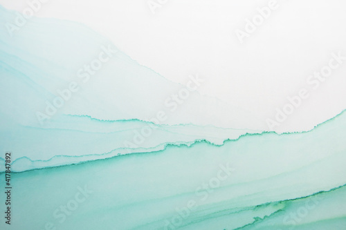 Artistic background that applicable for design cover, poster, brochure. Modern art. Marble texture. Natural pattern. Ink colors are amazingly bright. Alcohol ink sea texture. Contemporary art.