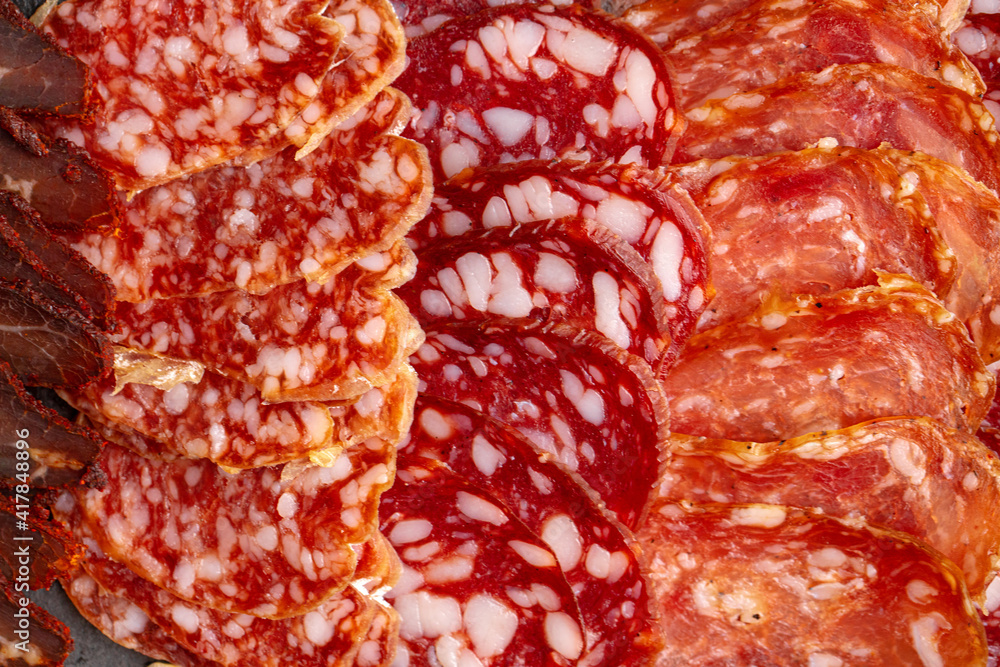 Delicious meat slicing on plate close up Delicious meat slicing on plate close up