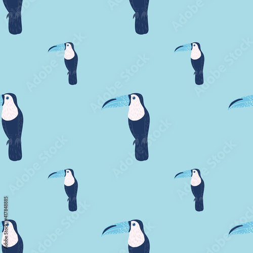 Jungle bird seamless pattern in doodle style with simple toucan shapes ornament. Blue palette bird print.