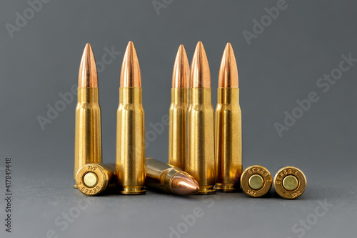 Fotografie Bullets on gray background