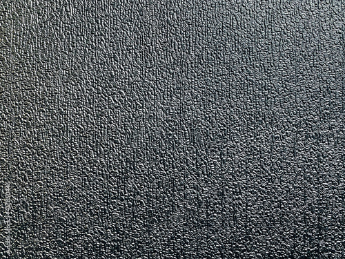 Black leather that looks elegant and beautiful can use in websites,graphic design,backdrop for item Unique pattern and texture with copyspace. wallpaper and background.