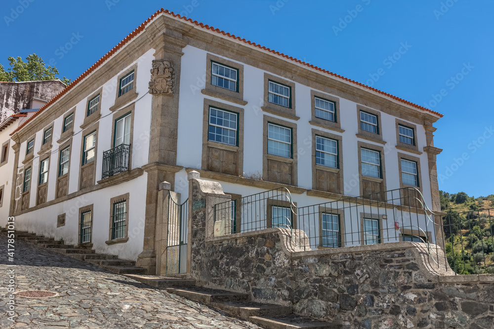 Exterior view of a building on Braganca city downtown, portuguese vernacular architecture Exterior view of a building on Braganca city downtown, portuguese vernacular architecture