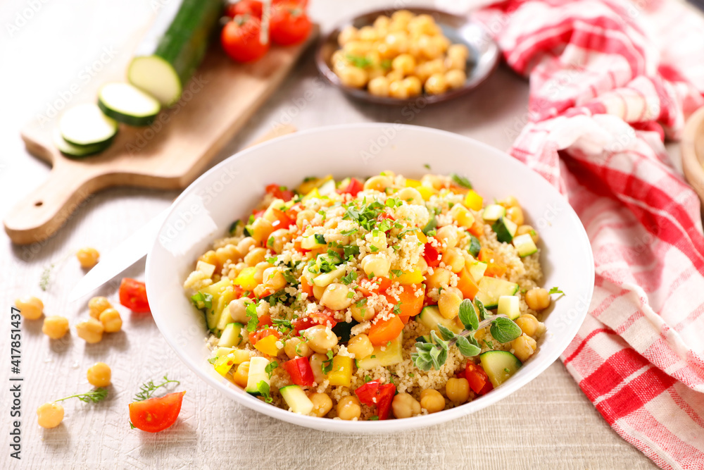 bowl of vegetarian couscous and ingredients bowl of vegetarian couscous and ingredients