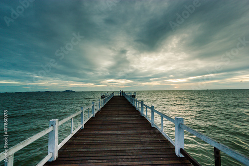 wood bridge in evening at Casaluna village in Thailand   wooden pier on the beach  Wooded bridge in the port between sunrise.