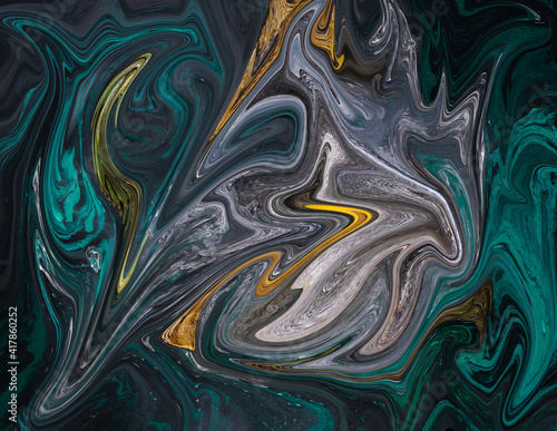 art photography of abstract marbleized effect background. Gold and balck, green creative colors. Beautiful paint.