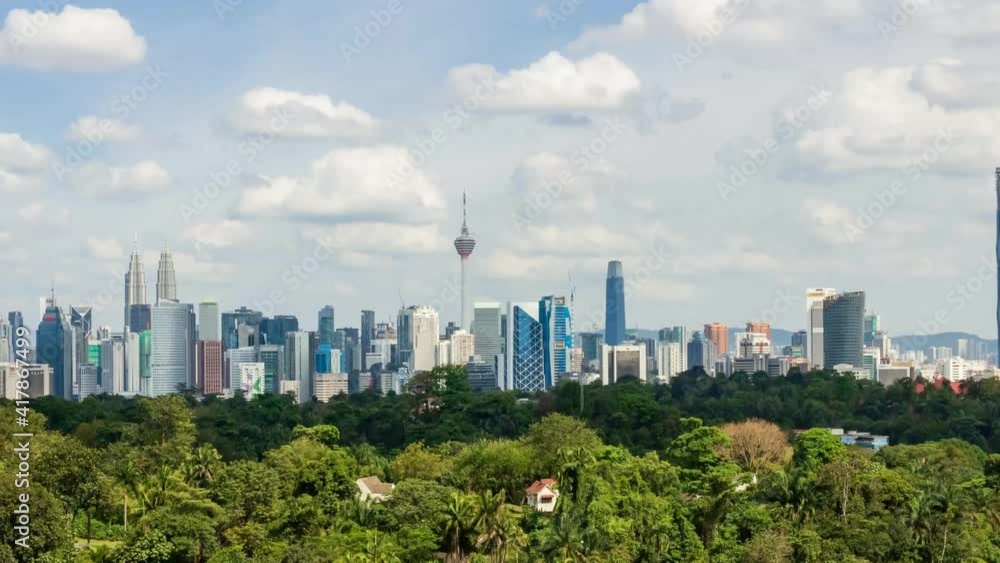 Time lapse of cloudy sky at Kuala Lumpur city skyline Time lapse of cloudy sky at Kuala Lumpur city skyline