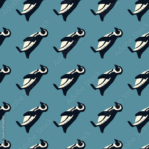 Decorative cute seamless pattern with hand drawn penguins silhouettes. Blue background.