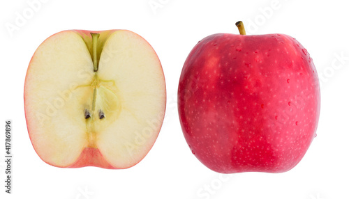 Pink lady apples with water drops isolated on white background.
