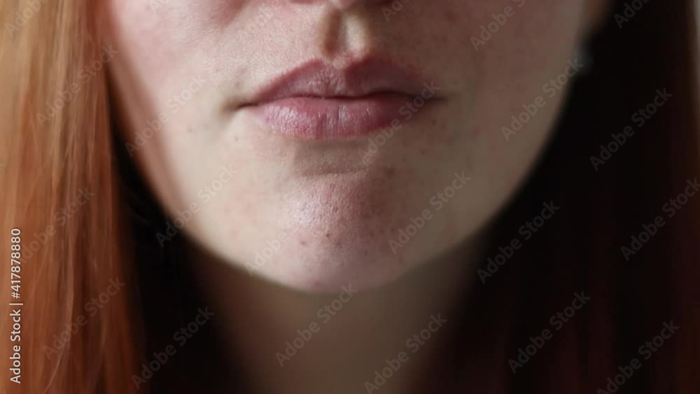 Close up portrait of Caucasian girl eats blueberries, close up Close up portrait of Caucasian girl eats blueberries, close up