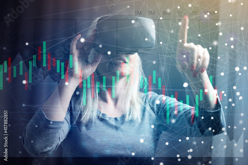 Obraz na plátne Portrait of businesswoman in virtual reality glasses working in her office