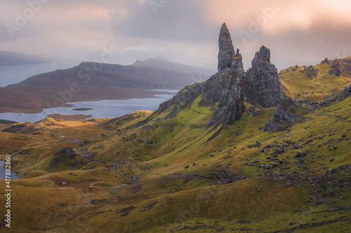 Dramatic sunrise or sunset view of the prehistoric Scottish Highlands landscape of the rock pinnacle Old Man of Storr on the Isle of Skye, Scotland.