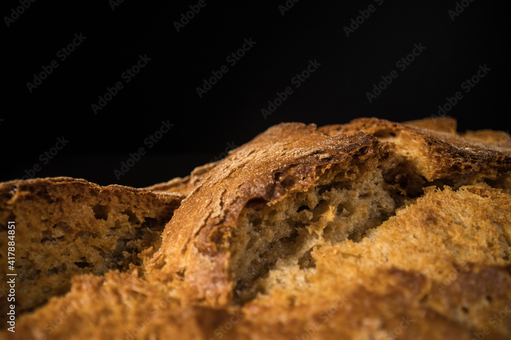 Freshly baked loaf of bread - close up shot Freshly baked loaf of bread - close up shot