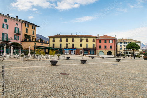 The main square of Colico with its colorful houses photo