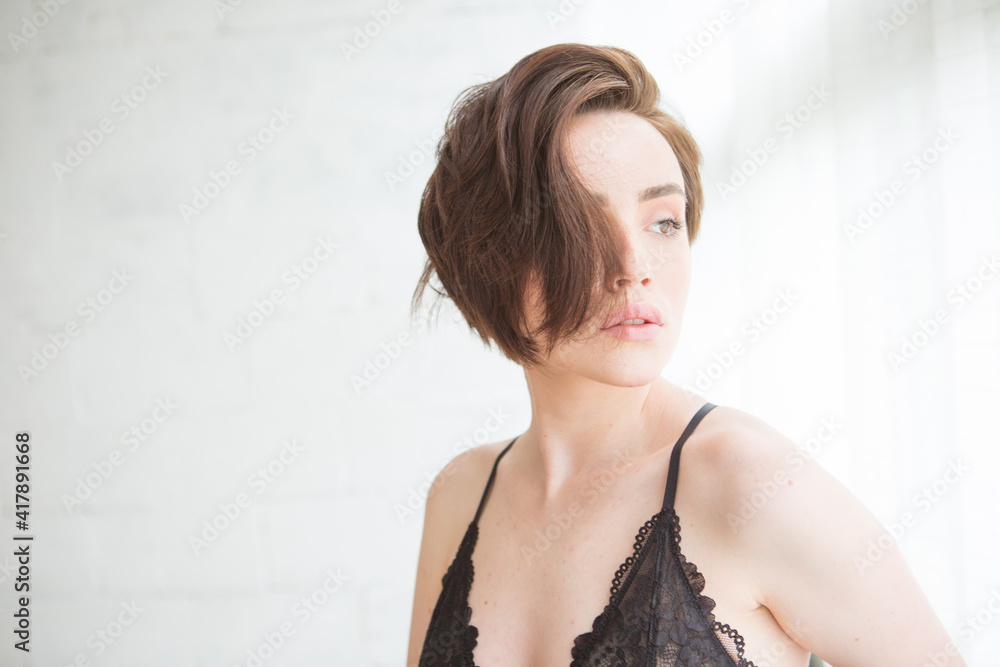 Lovely beautiful girl in elegant underwear in the room Lovely beautiful girl in elegant underwear in the room