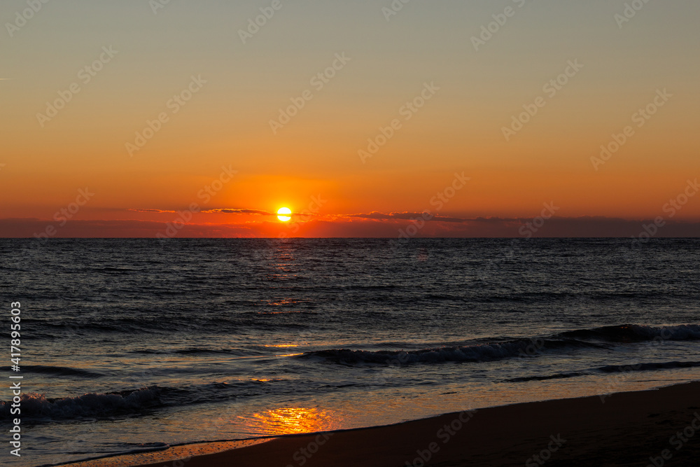 Cloudless sunset over ocean. Natural colors.