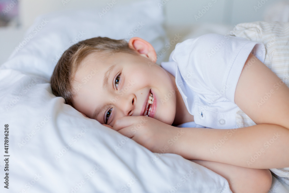 Cute boy sleeping in bed Cute boy sleeping in bed