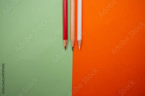 color pencil orange and green background