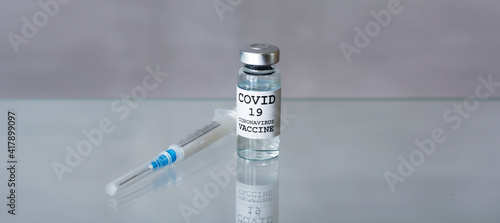 Vaccine and syringe injection. It use for prevention,immunization and treatment from corona virus infection(novel coronavirus disease 2019,COVID-19,nCoV 2019 from Wuhan). Medicine infectious concept.