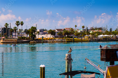 Johns Pass is a shopping and tourist attraction on the Gulf Coast of Florida in the town of Madeira Beach. Originally a fishing village