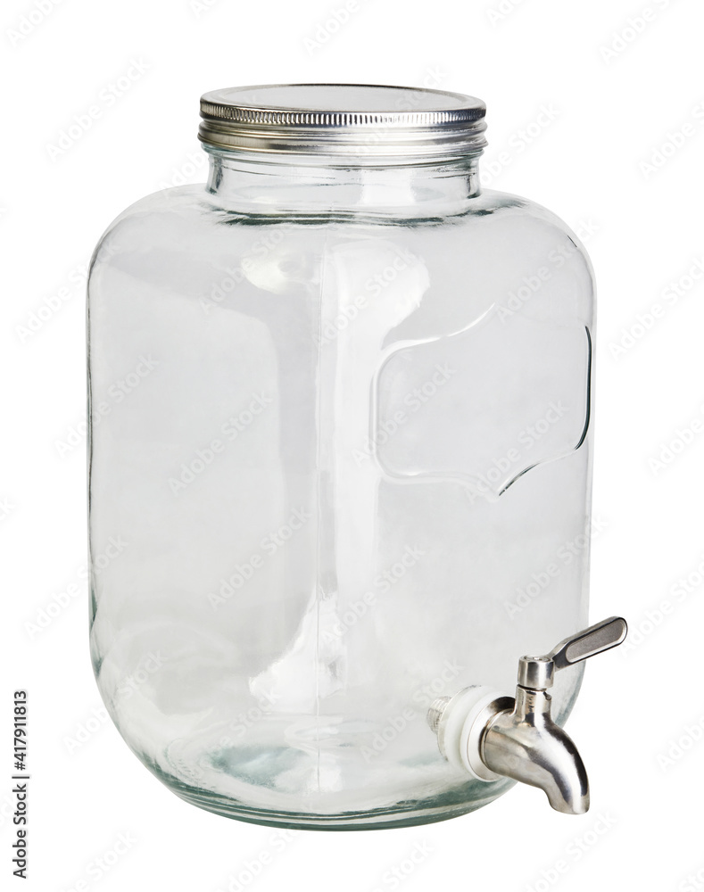 Big transparent glass jar with tap for refreshing summer drinks