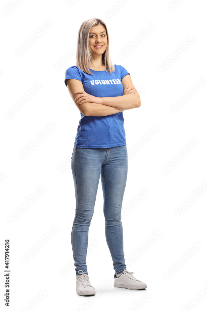 Full length portrait of a young woman volunteer smiling Full length portrait of a young woman volunteer smiling