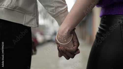 Couple disjoining hands, lovers separating-