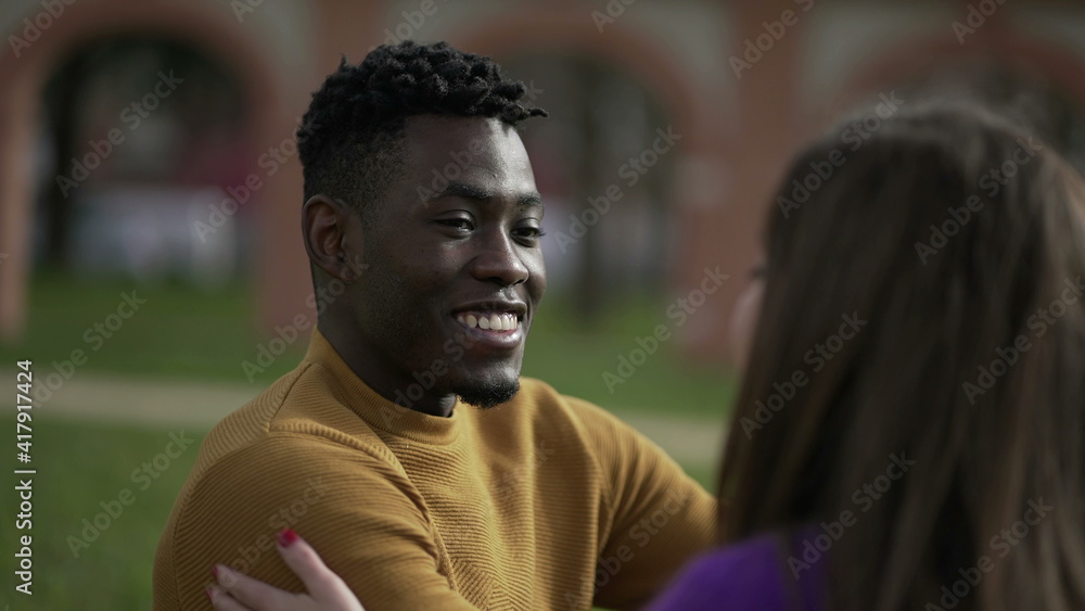  Friendly happy black African man on a date with girl