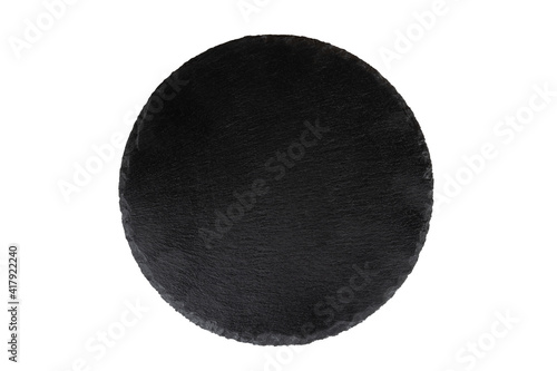 Black slate   round stone plate . Kitchen stone tray for food isolated on white background.