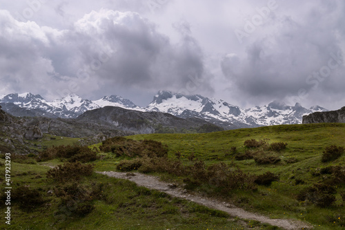 Picos de Europa, Spain, May 24, 2018: In an environment where the green surrounds us we have the mountain magnifying the horizon.