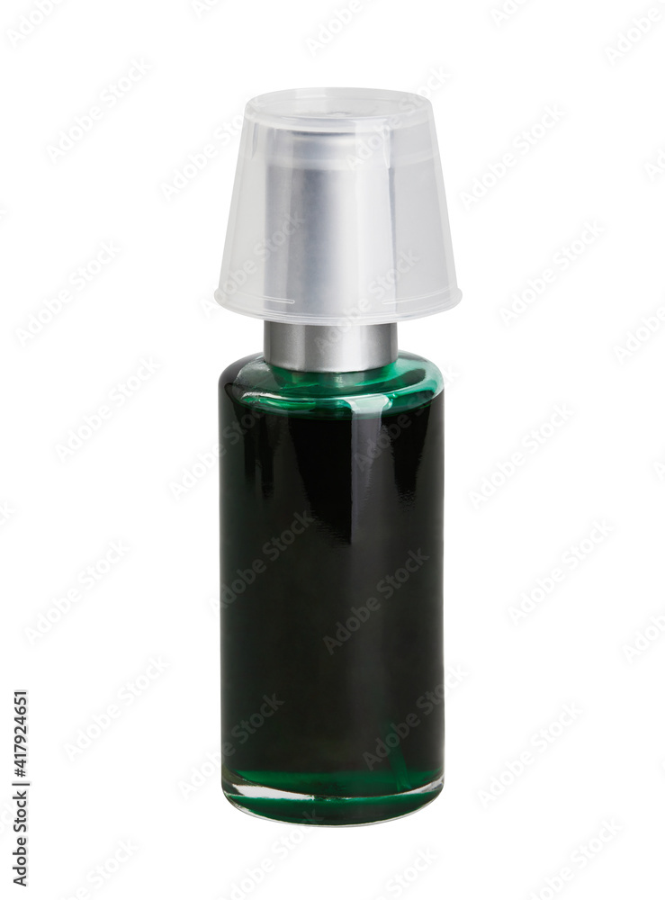 Transparent glass a bottle with a measuring cup isolated on a white background with a clipping
