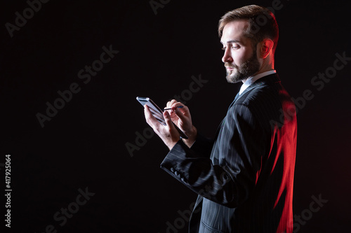 A man in a business suit wi...