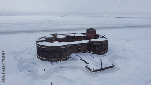 Defensive installations of the Fortress of Kronstadt. Forts of the Island Kotlin. Fort Alexander I in winter time aerial video.