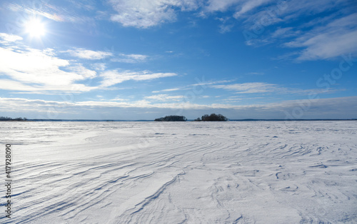 Snowy plain on a clear winter day © AliaksandrBS