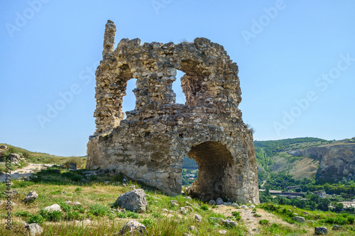 Remains of medieval tower with gates, part of fortress Kalamita, Crimea. It was founded by Byzantines in VI. In XV it was captured by Turks. Now it's quiet tourist place nearby Inkerman Cave Monastery photo