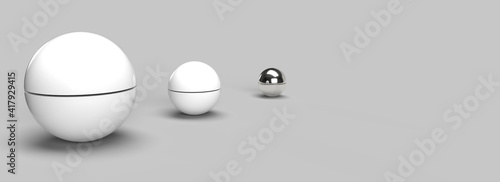 Three big spheres over a gray background in a minimalist interior. 3d render © uklanor
