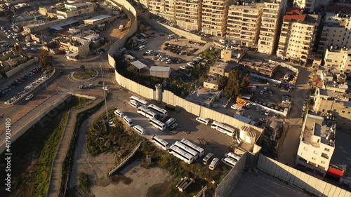 Anata Refugees Camp with security wall and idf watch tower- aerial view Drone view from east Jerusalem, close to pisgat zeev neighbourhood, jerusalem 