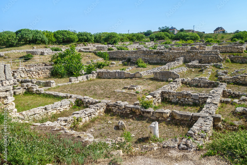 Panorama of remains of ancient city Chersonesus, Sevastopol, Crimea. There are ruins of residential block, streets and public buildings
