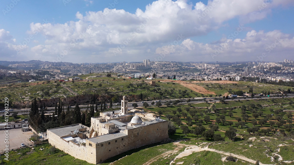 Naklejka premium Mar elias monastery and Jerusalem in background, Aerial view drone view over Greek Orthodox monastery in south Jerusalem 