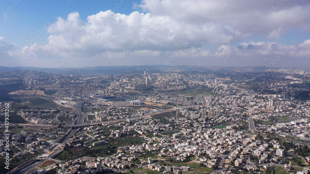 Jerusalem City wide aerial Flight view
Drone high altitude view of Jerusalem,clouds and Blue skies March 2021 Israel

