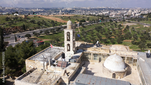 Fotografie, Obraz Mar elias monastery and Jerusalem in background, Aerial view
drone view over Gre