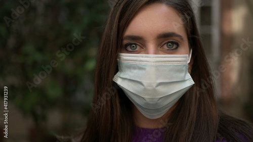 Young woman wearing covid-19 face mask