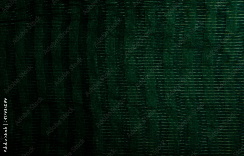 Green cloth background and texture, Grooved of green fabric abstract