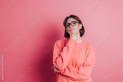Woman wearing casual sweater on background thinking worried about a question, concerned and nervous with hand on chin © Анастасия Каргаполов
