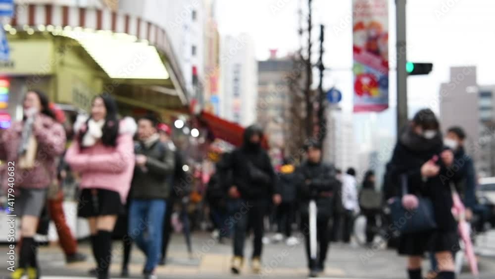 Blurred motion : pedestrians walking at Akihabara district Tokyo Japan Blurred motion : pedestrians walking at Akihabara district Tokyo Japan