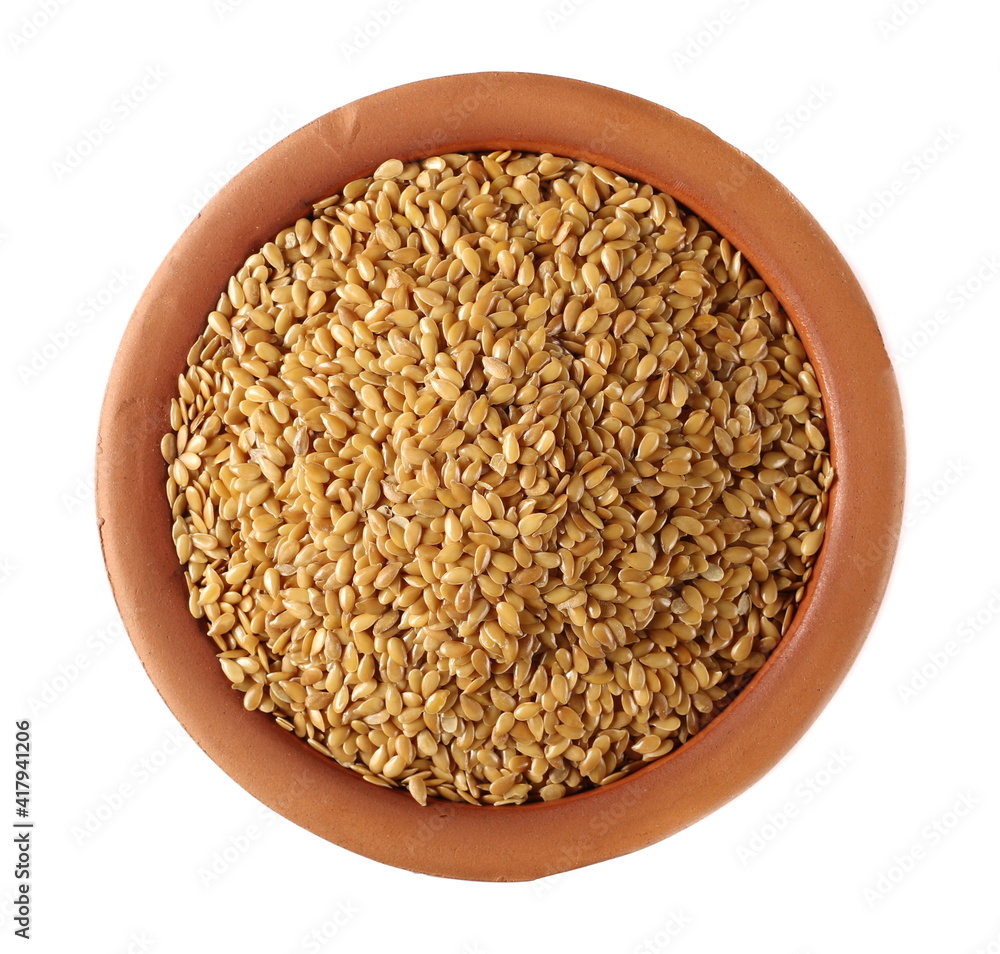 Golden linseed, linen seeds in clay pot isolated on white background, top view Golden linseed, linen seeds in clay pot isolated on white background, top view