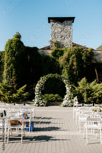 wedding ceremony in the woods among the trees on the green track photo